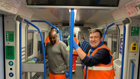 Cleaners applying the long-lasting viruscide to trains at Bedford 24 April