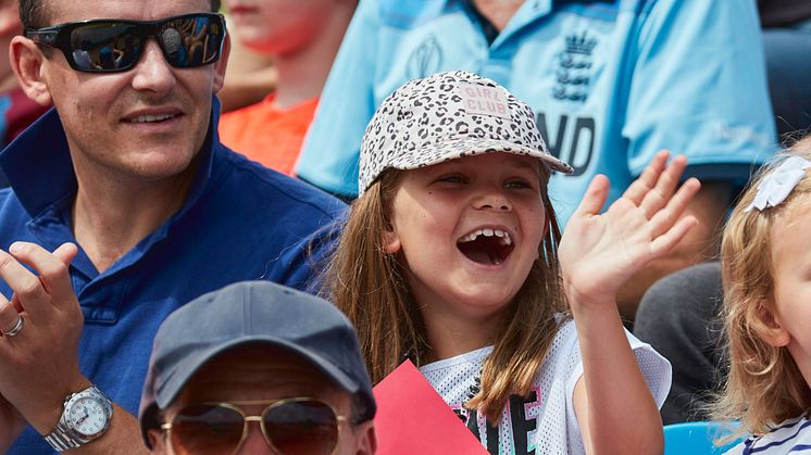 A young fan cheers at an England match. Image: ECB