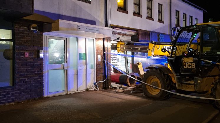 Hole in the wall: The JCB before it was removed - Picture Network Rail