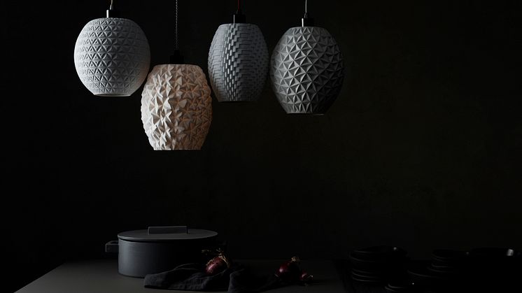 The sculptural porcelain objects are also a highlight in the interior area as extraordinary lampshade. 