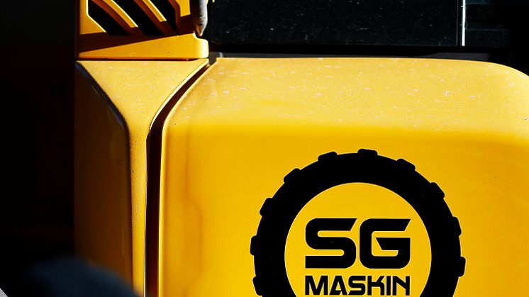 SG Maskin - logotype på hjullastare