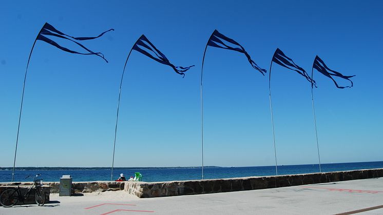 Vimplar och sittkuddar återintar Strandpromenaden