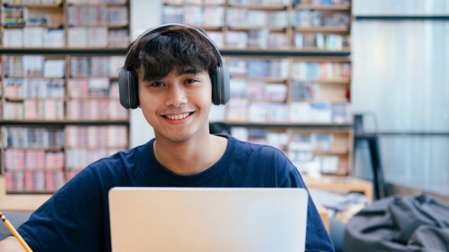 Teen exchange student studying online