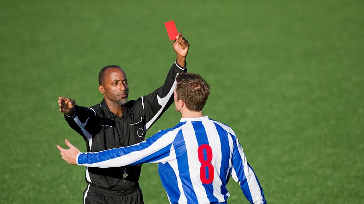 Football referees cope by thinking they are better than other refs