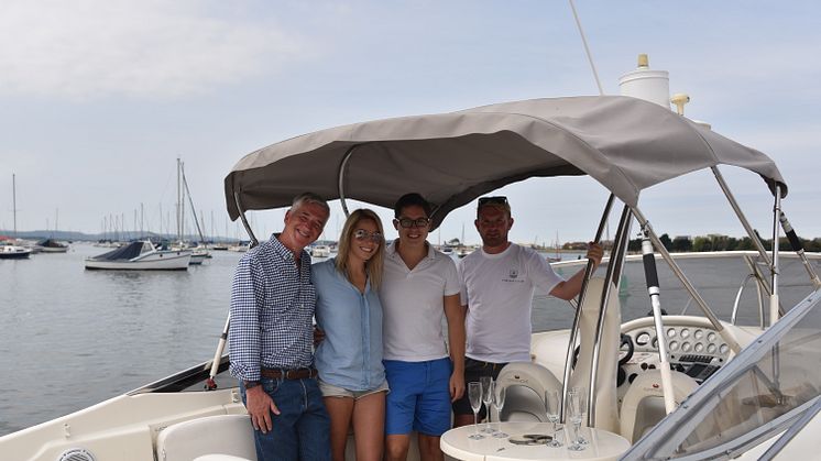JL Audio's summer competition winners (centre) with JL Audio's Paul Baker (left) and The Boat Club's Mark Morris (Right)