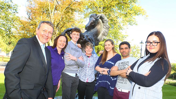 Newcastle Business School’s Nigel Coates (left) with first year business students at Newcastle Racecourse