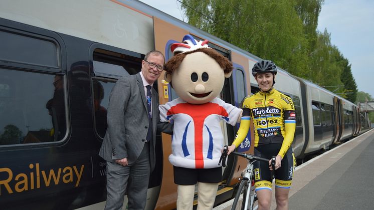 Richard Brooks (West Midlands Railway) and Pro Rider Beth Crumpton at Redditch railway station