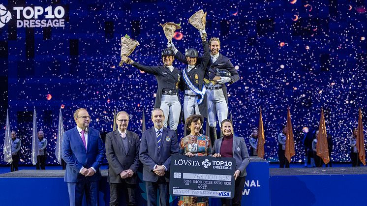 On the podium: Isabell Werth, Jessica von Bredow-Werndl and Patrik Kittel.  In front: Magnus Ringmark, Bo Jenå, Ulf Brömster, Antonia Ax:son Johnson and Tinne Vilhelmson Silfvén.