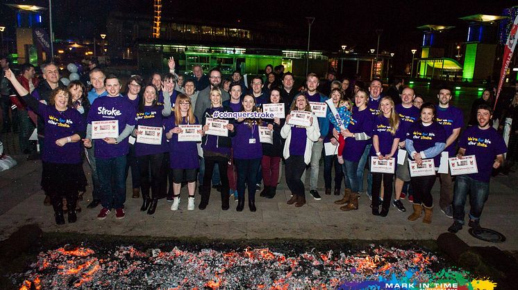 35 people from across Bristol walk over hot coals for stroke