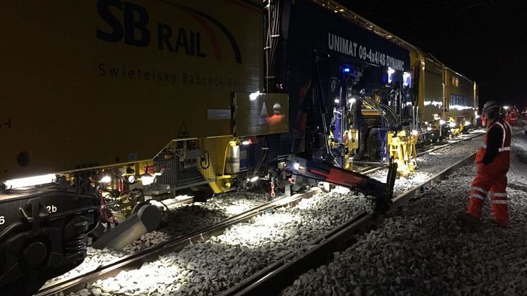 A Network Rail tamping machine in action