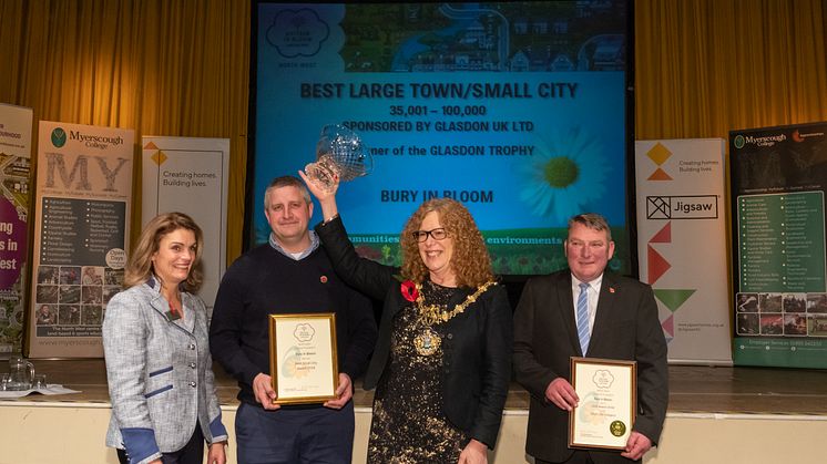 Blooming brilliant! At the awards ceremony are (from left) Teresa Potter, North West in Bloom judge; Kevin Dickinson, grounds maintenance manager; the Mayor of Bury, Councillor Jane Black; and Peter Turner, grounds maintenance foreman.