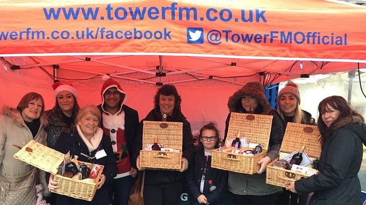 Santa’s gifts to shoppers on Bury Market