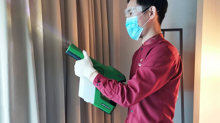 Housekeeping Attendant disfecting guest room at PARKROYAL on Beach Road with the Professional Cordless Electrostatic Handheld Sprayer 2.jpg