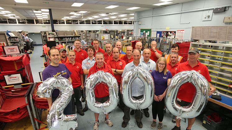 Staff from Royal Mail Lisburn Delivery Office with Paul Montgomery, Community Fundraising Manager and Aibhlin Neeson, Health and Wellbeing Coordinator, Stroke Association