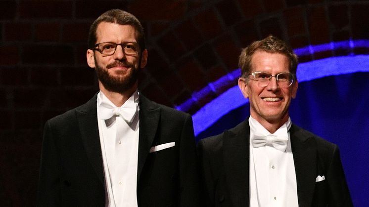 Tobias Kuemmerle & Scott Creel vid akademiens högtidssammankomst den 28 januari 2018. Foto: Erik Cronberg/KSLA.