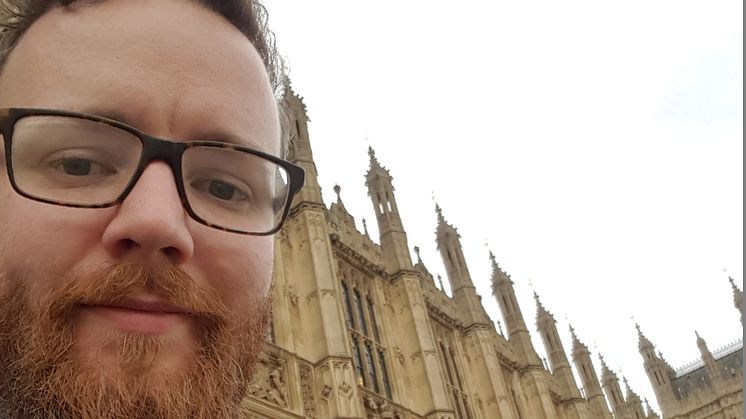 Euan Macfarlane outside The Houses of Parliament