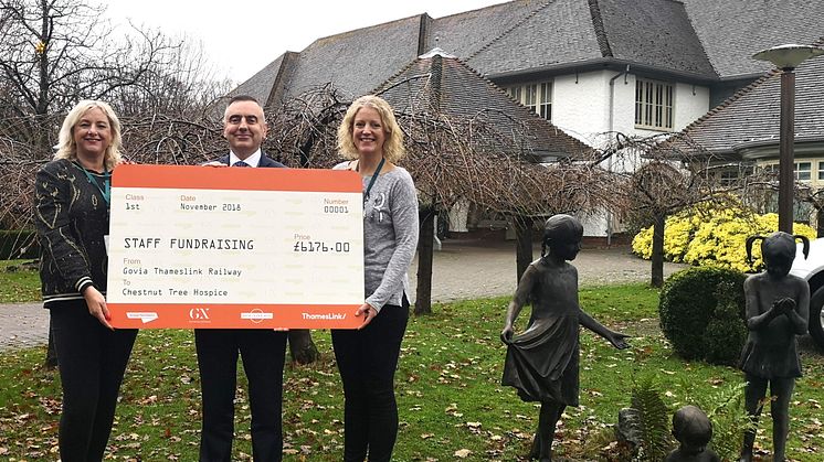Andy Bindon, HR Director at GTR, presents the cheque to Chestnut Tree House's corporate fundraisers, Mikayla Bernstein (left) and Alison Taylor (right) at the Arundel-based children's hospital .