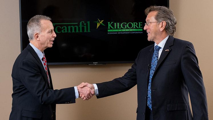 Armando Brunetti, president of Camfil Americas, and Kilgore mayor Ronnie Spradlin, speak about plans for Camfil USA to build a manufacturing facility in Kilgore's Synergy Park.  (Michael Cavazox/News-Journal Photo)