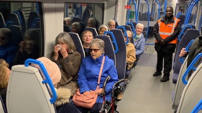 Members of local community group DR96 ride a Thameslink train to St Pancras with station staff. A high resolution version of this picture is available at the bottom of this page