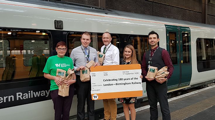 London Northwestern staff at Euston station celebrating 180 years of trains between London and Birmingham