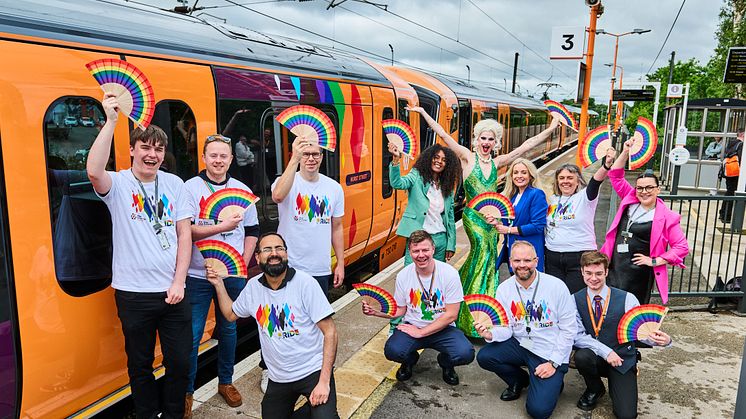West Midlands Railway staff with drag queen Cycki Brokat and Char Bailey from Birmingham Pride with the Hurst Street train