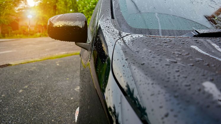 Water droplets evaporating on a car