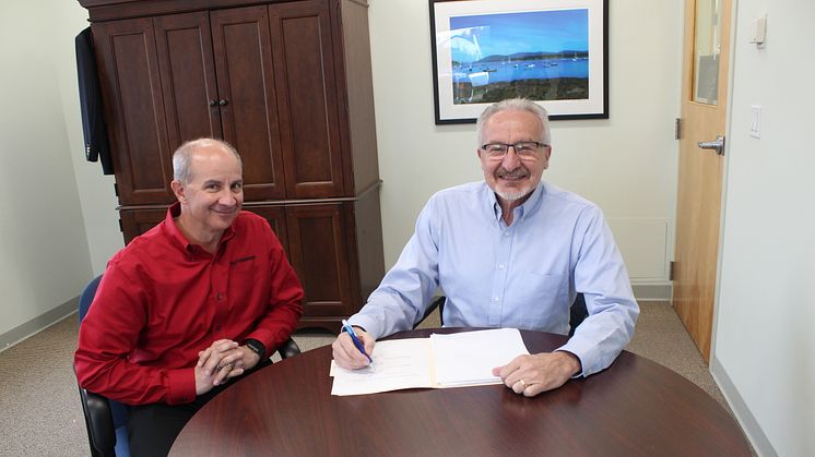 Jeff Albright (left), President, Yanmar America and Vincent Chiocchio, President, Controlled Air.