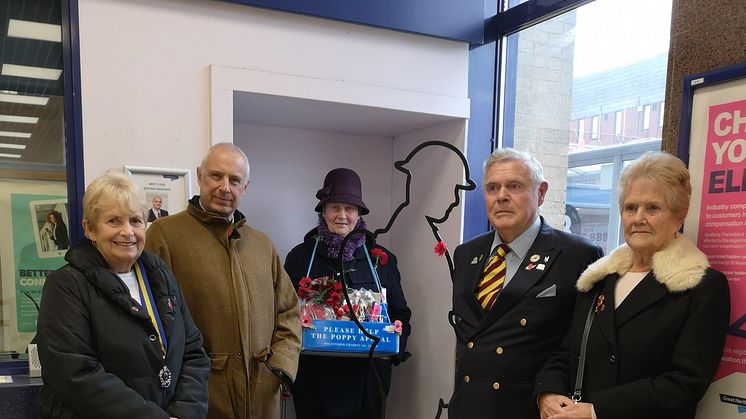Honouring railway workers' First World War contributions at Potters Bar station: (left to right) Joan Wright of the Royal British legion, GTR's Stuart Cheshire,  and Pat Budd, Joe Vaughan and Anne Moss of the British Legion.