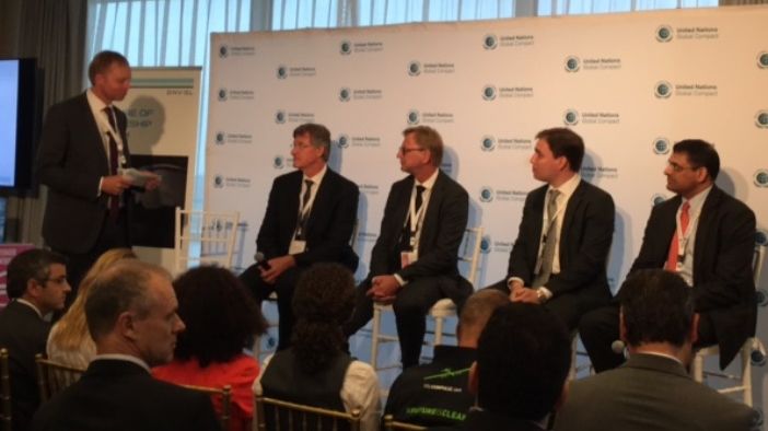 Cermaq's CEO Geir Molvik (sitting number two from left) at the launch of the report Future of Spaceship Earth