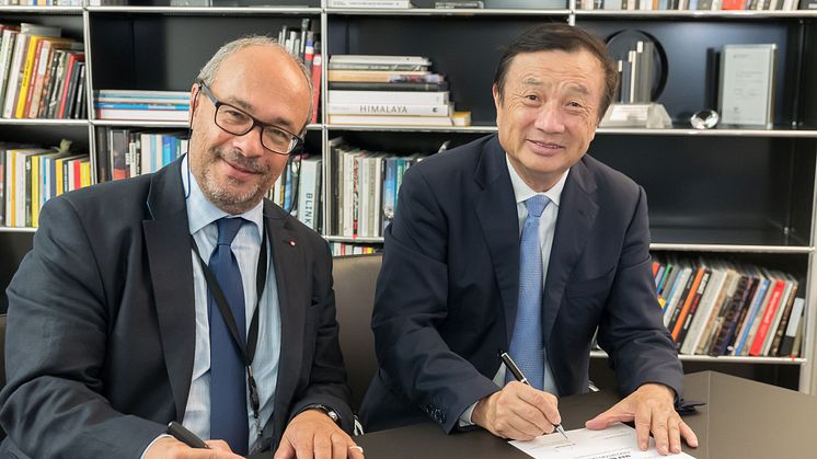 Dr. Andreas Kaufmann, Chairman at Leica and Mr. Ren Zhengfei, founder of Huawei 