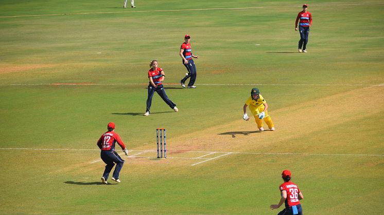 Katie George runs out Australia's Beth Mooney.