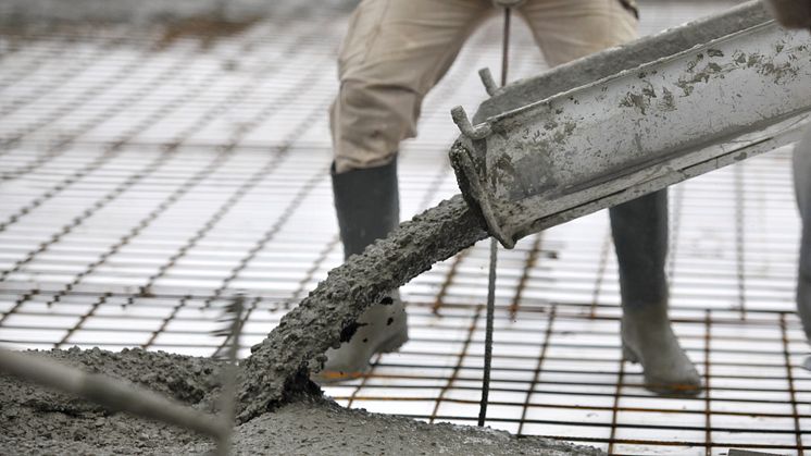 Cementgjutning på bygge. Foto: Mostphotos