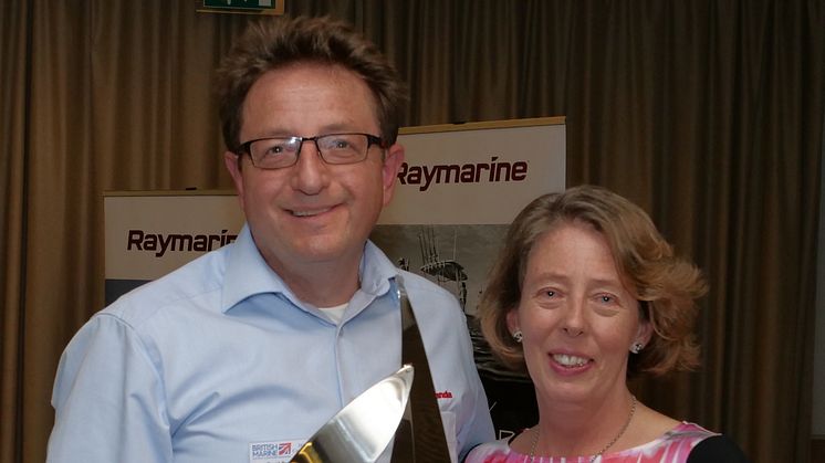 Hi-res image - Fischer Panda UK - Fischer Panda UK’s David Payne receives the BMEEA Product of the Year Award for the Neo generator duo, from Katina Read, Editor of Boating Business