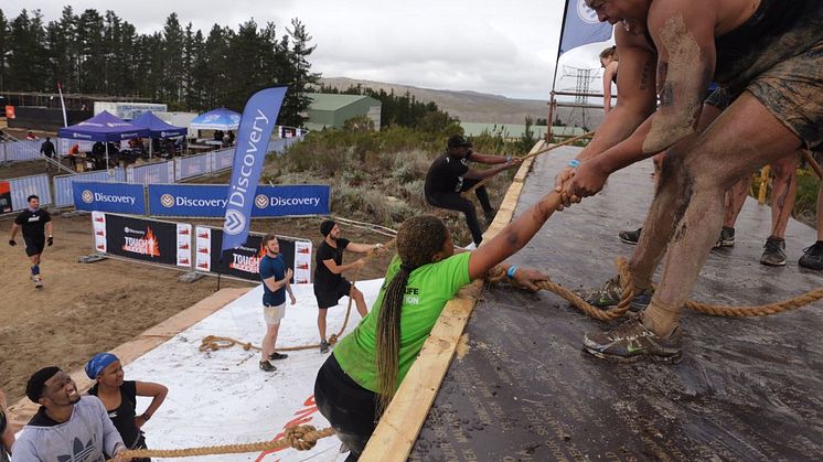 Tough Mudders overcoming Everest presented by Discovery. 