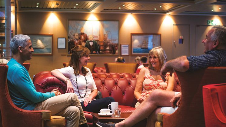 Guests in the Morning Light Pub on board Fred. Olsen Cruise Lines 
