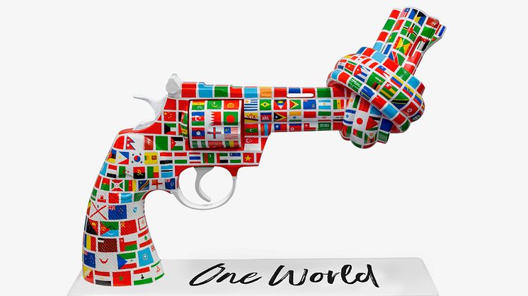 New Global Non-Violence Ambassador Johan Ernst Nilson and his knotted gun sculpture One World - to unite the world in peace.