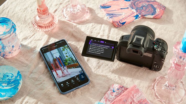 Canon EOS R50-ambient-high-angle-black-camera-marbling-setup-wireless-smartphone-connect