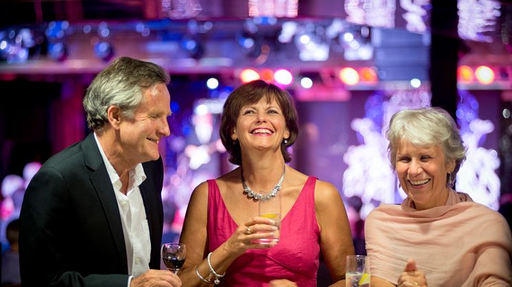 Friends enjoying drinks in the Neptune Lounge