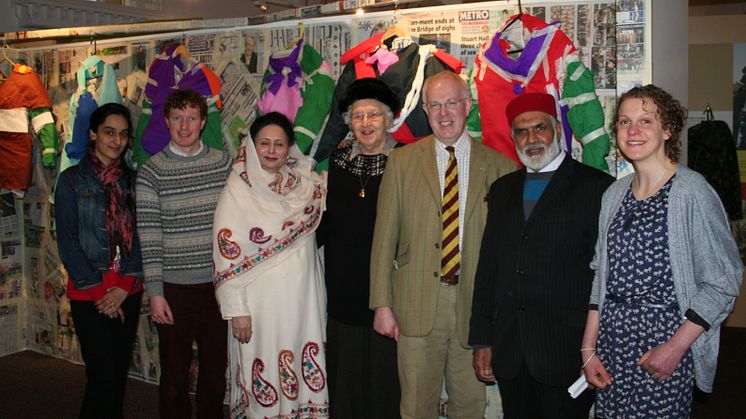 Asian women open the gates to the Fusilier Museum