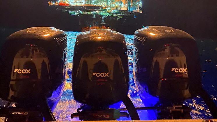 Cox Marine - Distributor Texas Diesel Outboard out on 'Justified' with triple Cox installation at night near the oil rigs.crop.