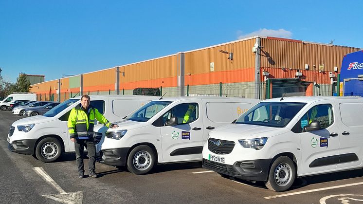 Cllr Alan Quinn with the new electric vans.