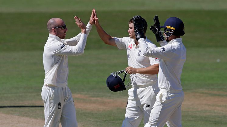 Jack Leach celebrates with Sam Hain and James Bracey