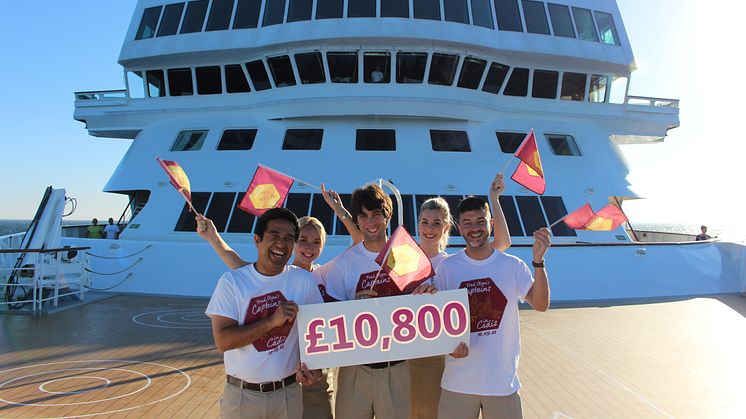 Crew from Fred. Olsen Cruise Lines' ship 'Braemar' celebrate raising £10,800 for the RNLI at the historic 'Captains in Cádiz' fleet gathering in Cádiz, Spain on 10th September 2018. 