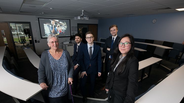 Elders Council Chair Anne Raffle, with students l-r Jakub Vana, Jakub Slachta, Ben Inman and Yen Hoa Tranova.