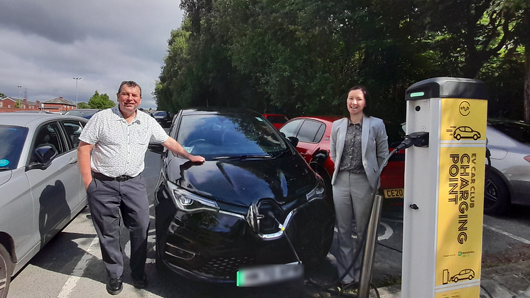 Cllr Alan Quinn and Candice Turner from Enterprise Car Club with the electric hire cars at Fairfax Road, Prestwich.