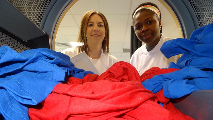 Test load in a tumble dryer - Kelly Sheridan and PhD student Chimdia Kechi Okafor.JPG