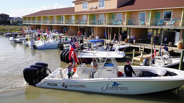 The Triple Cox-powered Invincible centre console powerboat, Justified, delivers Christmas Toys to underprivileged children in the Port O'Connor area of Texas