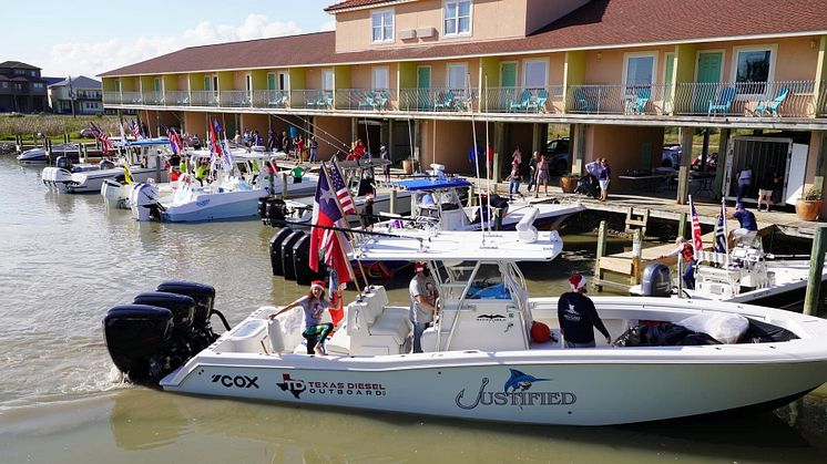 The Triple Cox-powered Invincible centre console powerboat, Justified, delivers Christmas Toys to underprivileged children in the Port O'Connor area of Texas