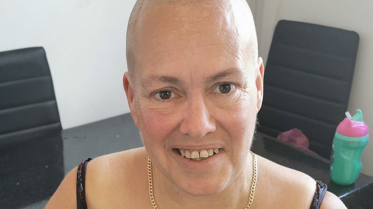 Debbie Davies head shave
