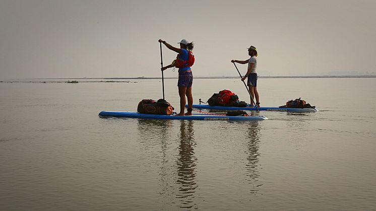 Team members Shilpika Gautam and Pascal Dubois head off from camp